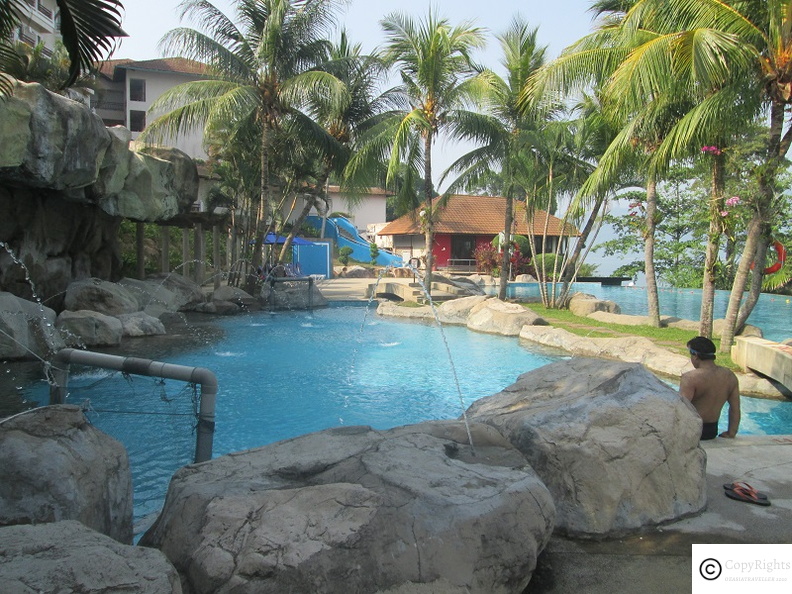 Relax in the beatitful pool overlooking Pangkor Laut Resort