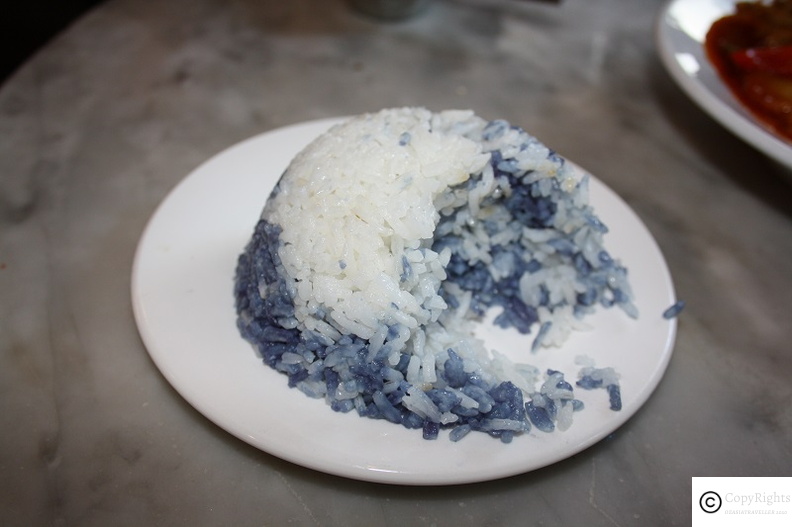 Rice coloured with blue coloured rice