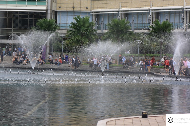 Enjoy the fountain show at sunset outside KLCC Suria Shopping Mall